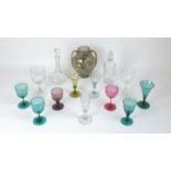 A group of 18th and 19th century glassware, comprising an amber glass trumpet sided wine glass