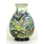 A Moorcroft Islay pattern baluster vase, the body decorated with shells and seaweed, coastline