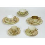 A group of Royal Worcester blush ivory tea cup sets, all with moulded decoration, comprising a