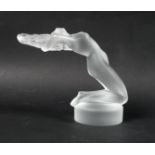 A modern Lalique clear crystal sculpture, modelled as 'Chrysis', a nude female kneeling with