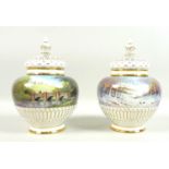 A pair of modern Royal Worcester potpourri vases and pierced covers, decorated by M. Powell in ‘
