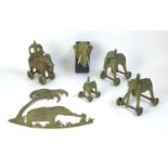 A collection of four Benin style bronze and brass elephants, all with mahouts and one with howdah,