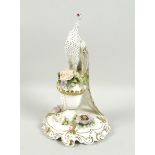 A Royal Crown Derby china figurine '100th Anniversary Peacock', limited edition 10/20, with