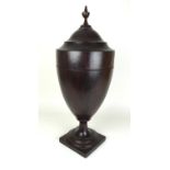 A 19th century mahogany pedestal urn knife box, the lid lifting to reveal fitted interior, 25 by