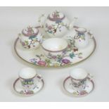 A Victorian Royal Worcester porcelain tete a tete tea service, decorated in Chinese style with