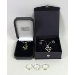 A group of silver and semi-precious gem set jewellery, comprising a Tiffany peridot and silver ring,