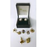 A pair of 9ct gold and pearl earrings, together with a small group of charms, including a 14ct