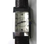 A Dunhill lady's stainless steel tank watch, circa 2000, with faceted glass, white rectangular dial,