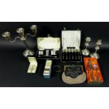 A group of silver items, comprising a pair of candlesticks, Birmingham 1968, W I Broadway & Co, a