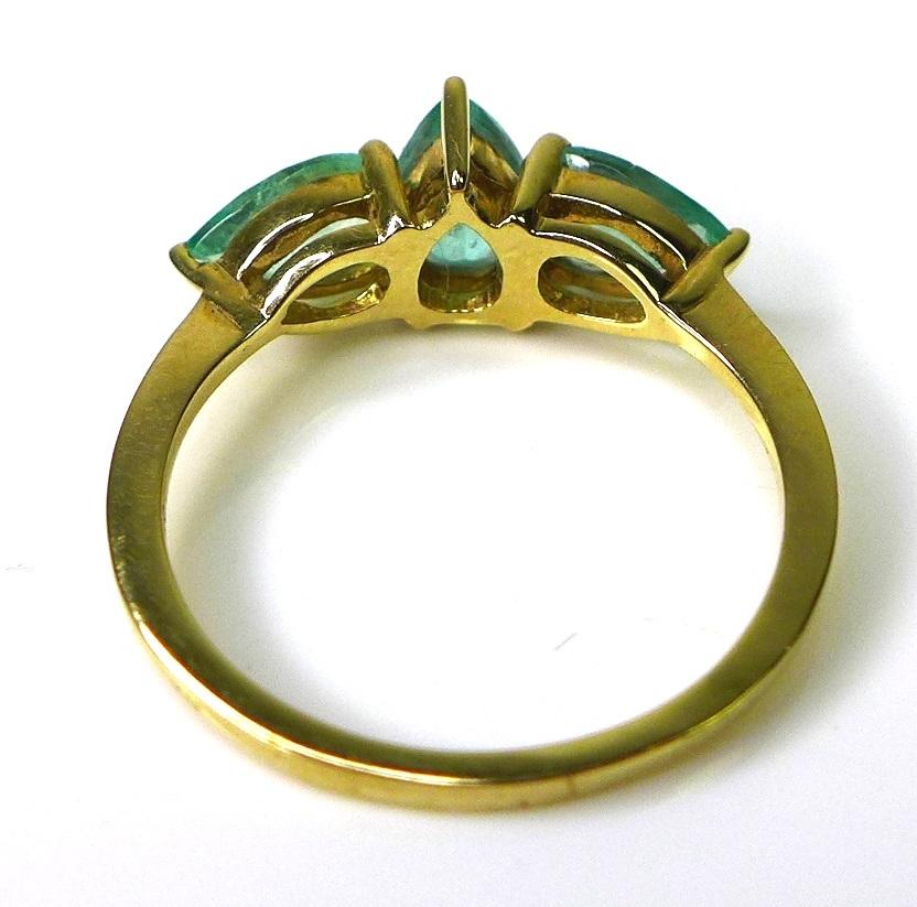 A 9ct gold ring set with three pear cut Siberian emeralds, approx 1.74ct total, limited edition 1 of - Image 4 of 7