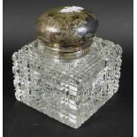 A Victorian silver topped cut glass perfume bottle, by Army & Navy Cooperative Society Ltd, London