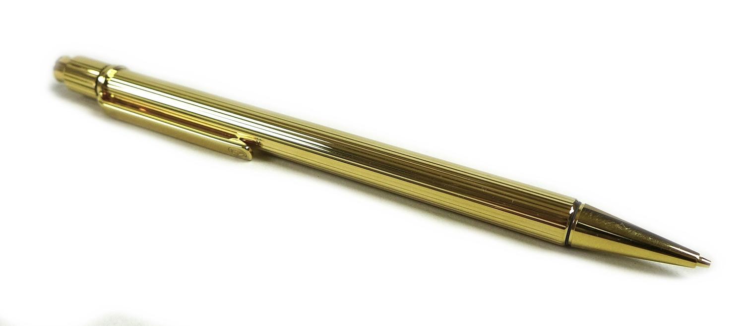 A Must de Cartier ballpoint pen and pencil set, composed of Stylo Mine Must II and Must II