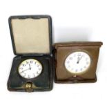 An early to mid 20th century Asprey eight day travel clock, contained within green leather case,