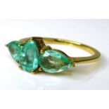 A 9ct gold ring set with three pear cut Siberian emeralds, approx 1.74ct total, limited edition 1 of