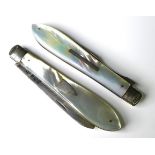A cased set of folding silver and mother of pearl cutlery, comprising knife and fork.