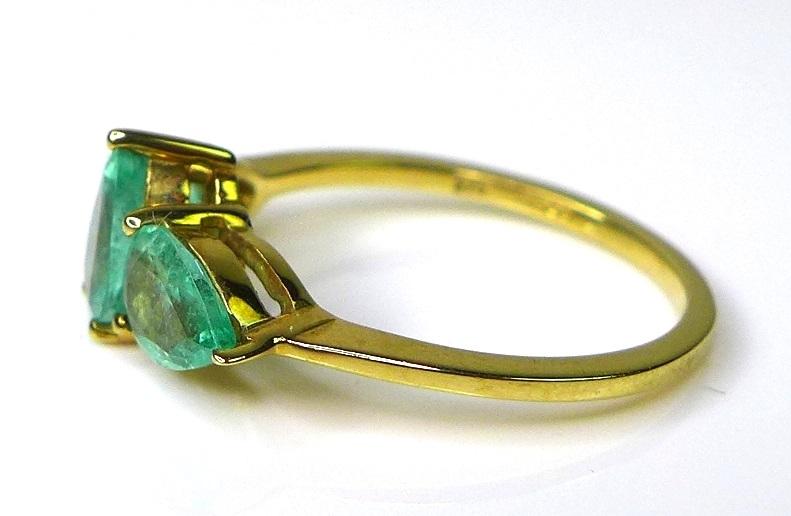 A 9ct gold ring set with three pear cut Siberian emeralds, approx 1.74ct total, limited edition 1 of - Image 3 of 7