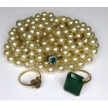 A 9ct gold ring set with green stone, size L, 7.1g, a 9ct gold ring set with smokey quartz, size
