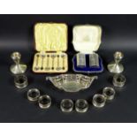 A group of silver items, including a pair of Victorian silver pepper pots, of fluted column form,