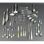 A collection of silver flatware, including a 19th century Sterling silver needle case, a 20th