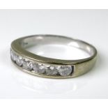 An 18ct white gold half eternity diamond ring, set with seven diamonds, approx 0.5ct total diamond