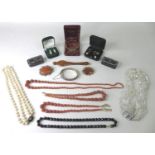 A quantity of costume jewellery, including a silver bangle, a silver charm, approximately 0.7toz,