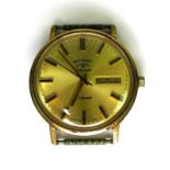 A vintage Rotary automatic watch with 9ct gold back, caliber 2066, the back of the case marked 9k