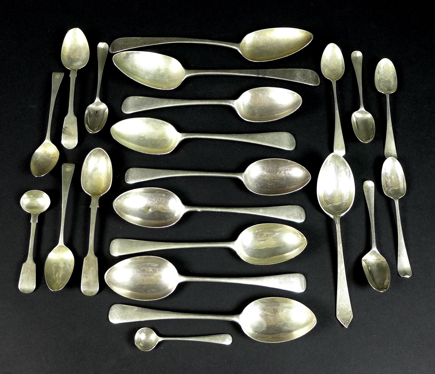 A group of Georgian and later silver spoons, comprising a pair of Georgian table spoons, engraved