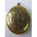 A 9ct gold locket, with engraved flower detail to the front, 4 by 3.4cm, 12.8g.