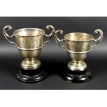 Two George V silver twin handled trophies, the first engraved 'Chertsey August Bank Holiday