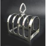 A George VI silver four division toast rack, with shaped carry handle, Viners Ltd, Sheffield 1940,