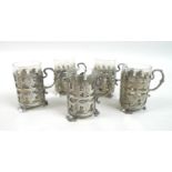 A set of five early 20th century silver mounted glass Turkish tea cups, the mounts with a pierced