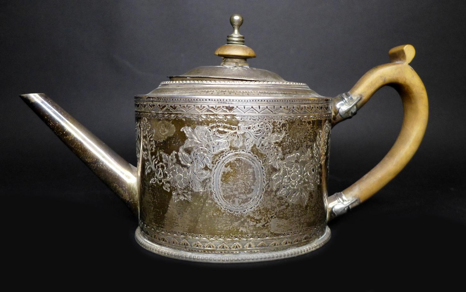 A George III silver teapot, decorated in Neoclassical taste with engraved swags and scrolls, - Image 2 of 7