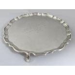 A George V silver salver tray, of circular form with Chippendale pie crust edge, presentation