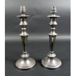 A pair of silver plated table lamps, converted from candlesticks with removable drip trays, of