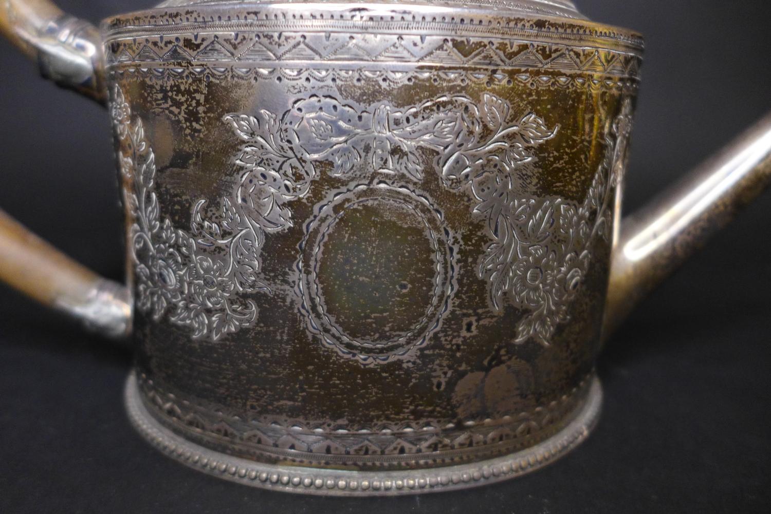 A George III silver teapot, decorated in Neoclassical taste with engraved swags and scrolls, - Image 3 of 7