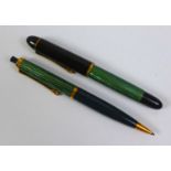 A vintage Pelikan 140 green and black fountain pen, with 14ct gold nib, 12.5cm, together with