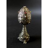 Judaica: a 19th century pre-revolutionary Russian silver egg, with filigree decoration throughout,