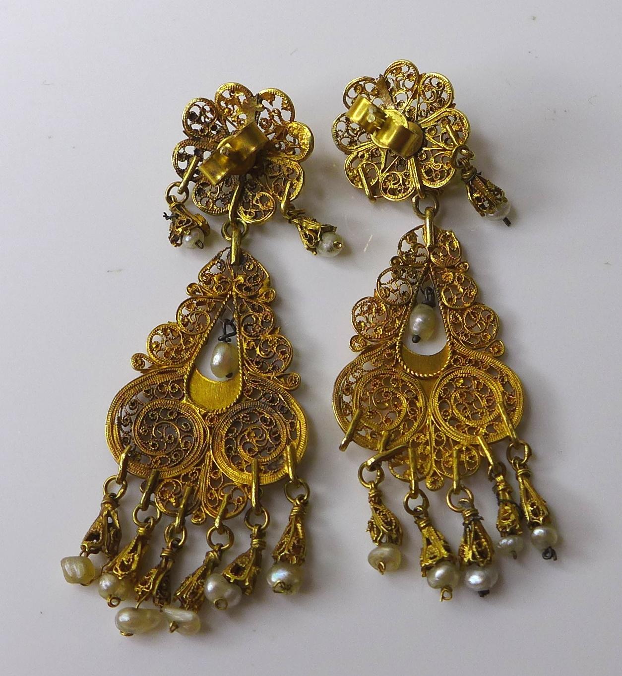 A pair of 1930s Indian 9ct gold earrings with seed pearl drops, very fine pierced decoration, each - Image 4 of 5