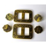 A pair of Japanese niello buckles, circa 1930, together with two pairs of matching buttons, designed