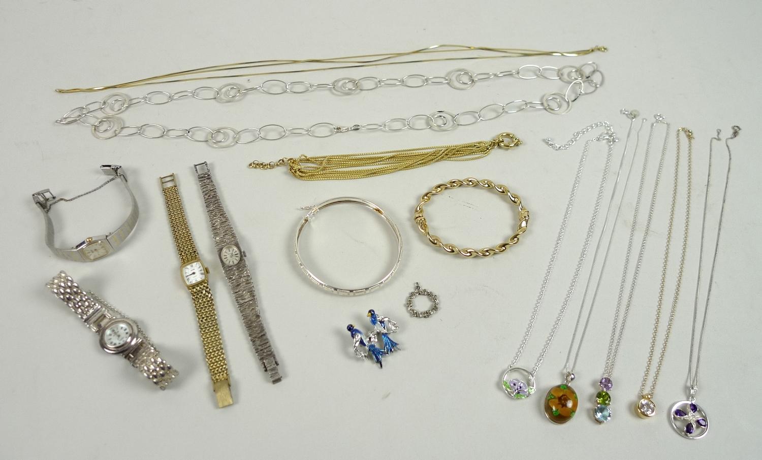 A collection of silver jewellery and wristwatches, including watches by Seiko and Accurist, and a