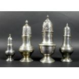 A group of four Victorian and later silver sugar sifters, comprising one by Royal Irish Silver Co,