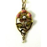 A 15ct gold and enamel pendant modelled as flower with five petals, enamelled with a pink blush,