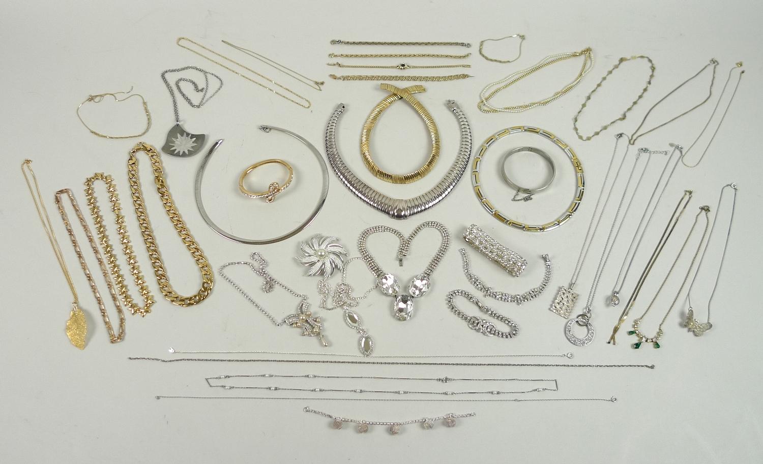 A quantity of silver, yellow and white metal costume jewellery, including several diamante items and