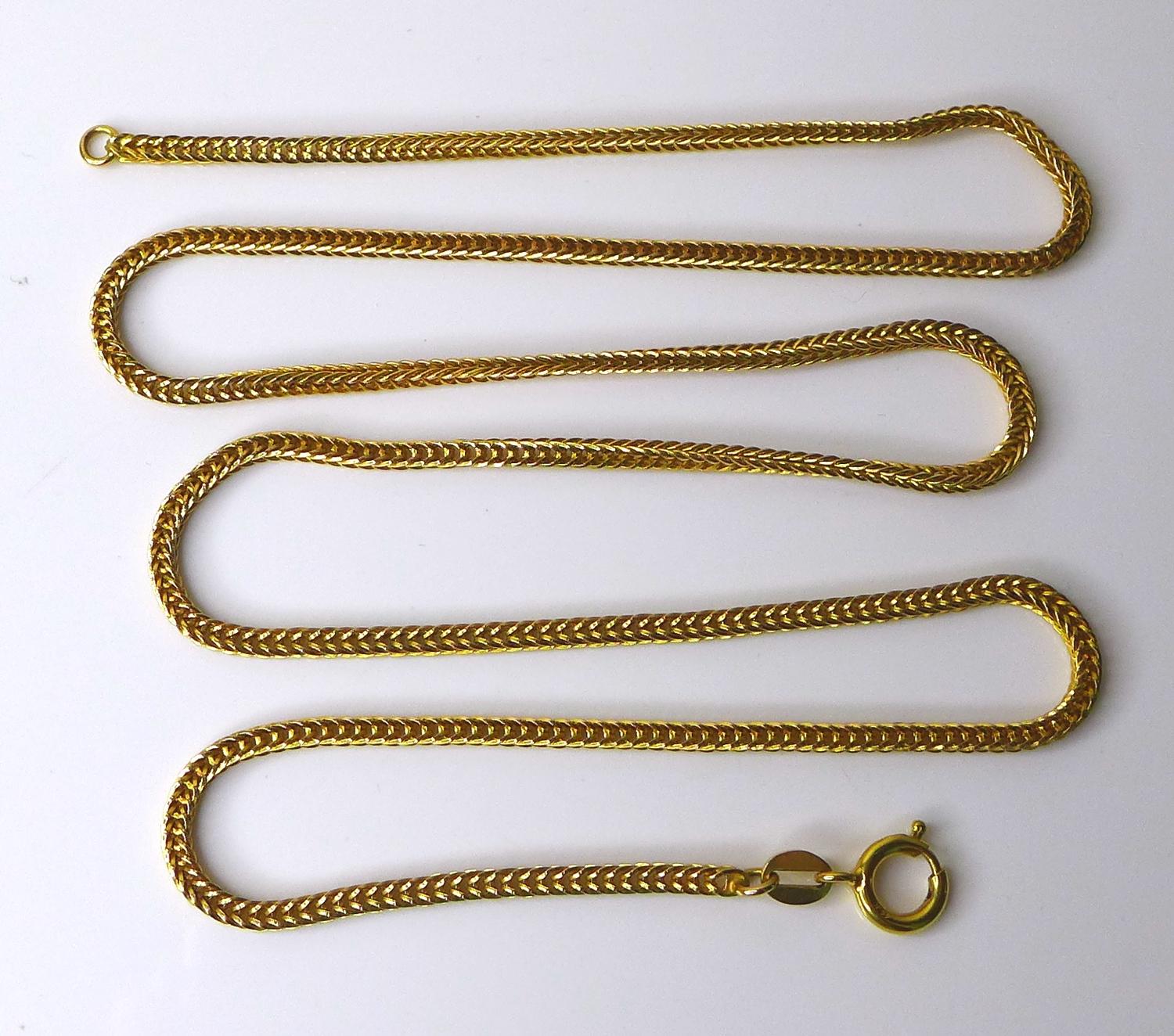 A 14ct gold chain of looped links, 13.6g, 61cm long.