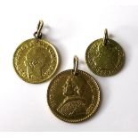 A group of three gold coins, comprising a Papal States Pius IX 2.5 Scudi, 1858, 4.45g, a George