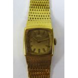 An 18ct gold Girard Perregaux lady's wristwatch, circa 1978, with textured link 18ct gold strap, the