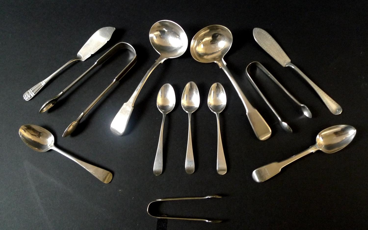 A group of Georgian and later silver flatware, comprising a pair of George III ladles, both 17.1cm