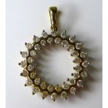 A 9ct gold and diamond circular pendant, with 40 round brilliant cut diamonds totalling
