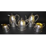 A five piece Elkington Silver plated tea and coffee service, of beehive form with foliate bright cut