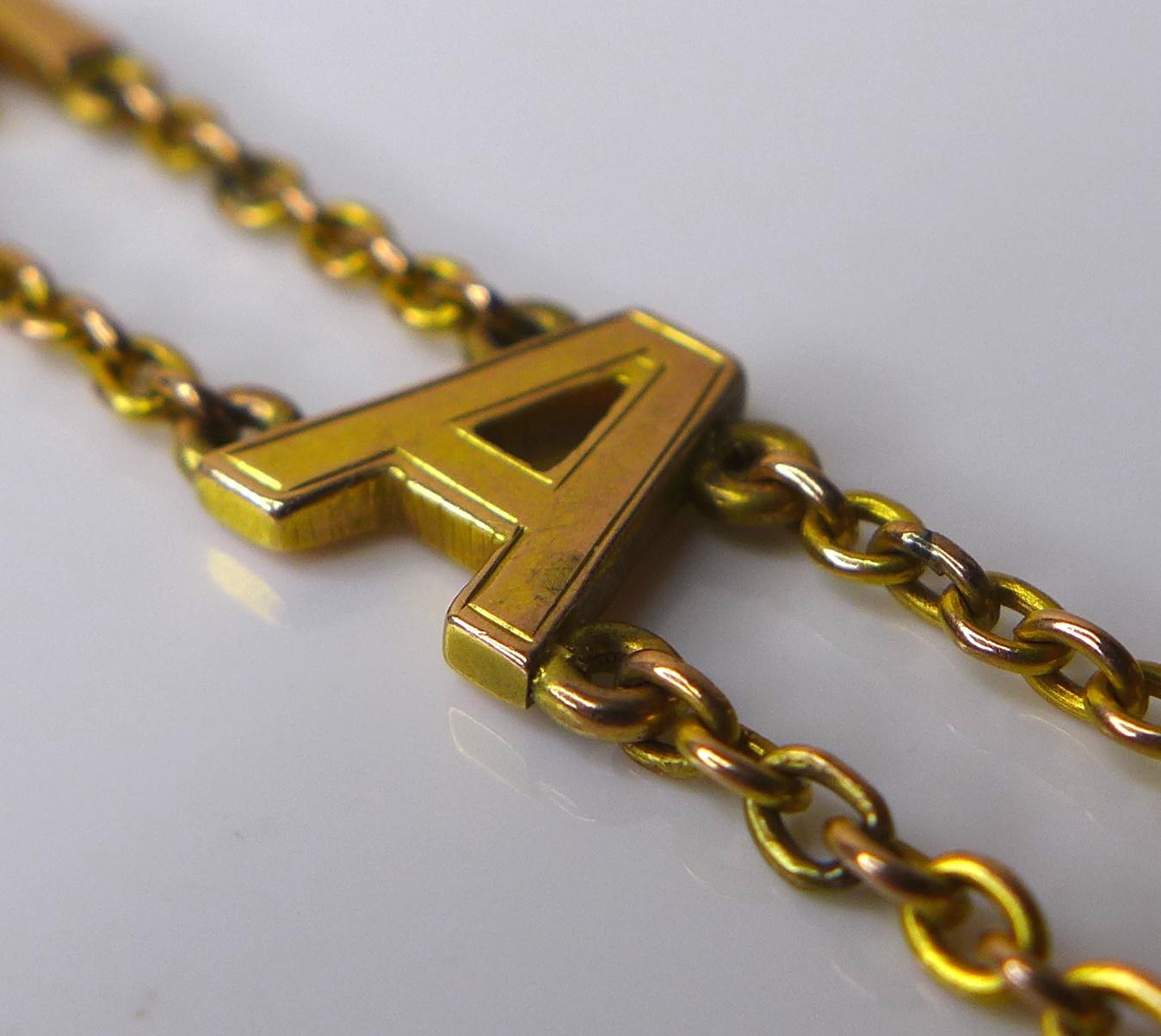 A 9ct gold 'Dearest' chain bracelet, early 20th century, stamped '9ct GOLD', 19cm, 10.4g. - Image 2 of 5